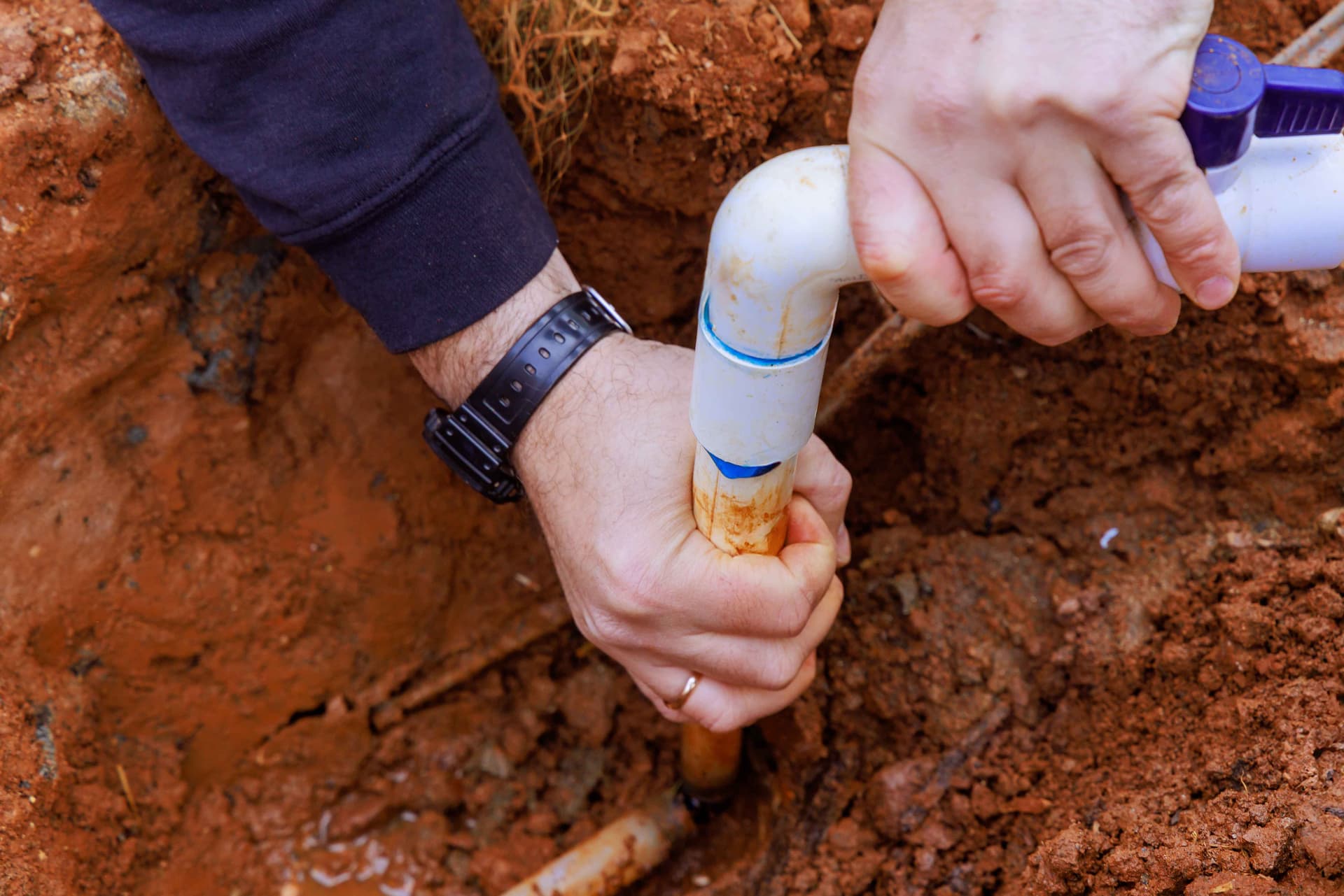 installing-a-glue-pvc-pipe-to-connect-house,jpg